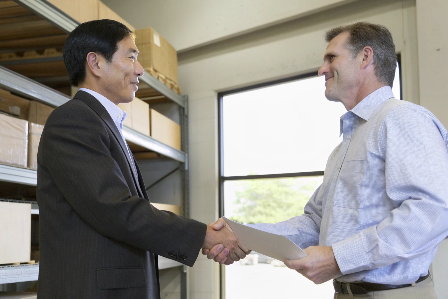 B2B Partnership Handshake and Cash Flow